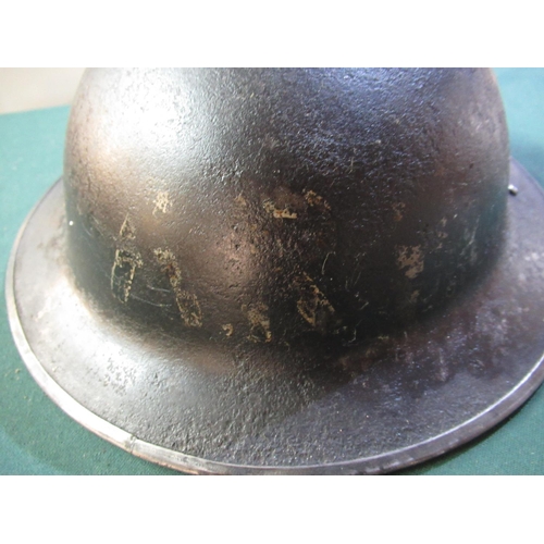 48 - British WWII period black painted civil defence helmet with faint ARP to the front (lacking liner)