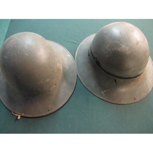 57 - Two British late WWII period steel helmet civilian type