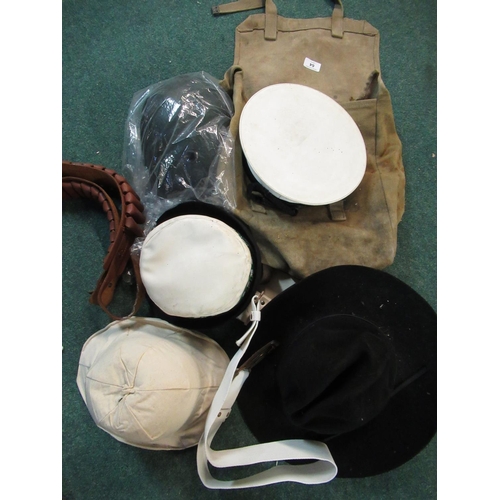 64 - British canvas haversack stamped 1916 with broad arrow mark, sailors cap various other hats, leather... 