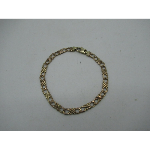 13 - 9ct gold flat figure of eight chain bracelet with lobster claw clasp L19.5, 10g