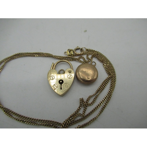 15 - 9ct gold heart padlock charm, yellow metal circular pendant and 9ct gold necklace with ibis pendant ... 