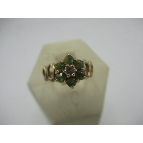 35 - Hallmarked 9ct gold peridot and diamond cluster ring, London, 1975  Size O, gross 2.9g