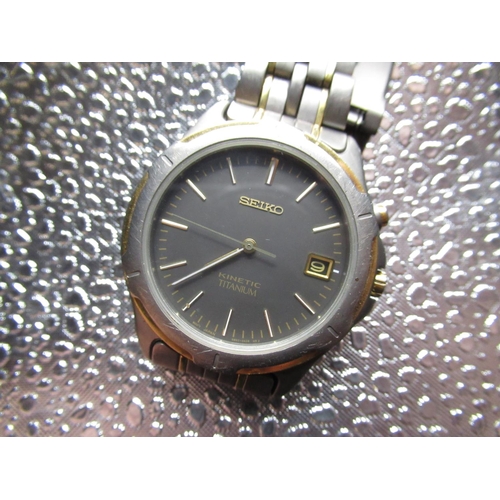 52 - Seiko Kinetic titanium with date, titanium case original bi metallic bracelet, screw off case back m... 