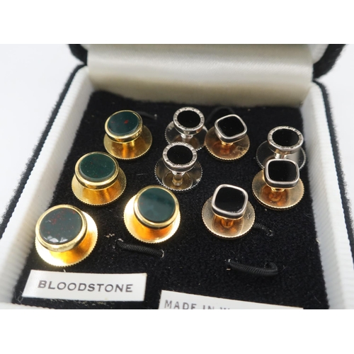120 - Four sets of gold plated collar studs inset with hardstones and two single collar studs