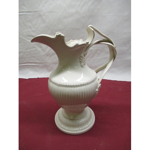 137 - Contemporary Leeds creamware jug of segmented baluster form with ribbon twist handle with impressed ... 