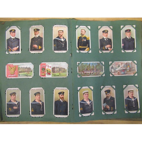 150 - Album containing cigarette cards including war ships, Player Cigarette Cards, small collection of la... 