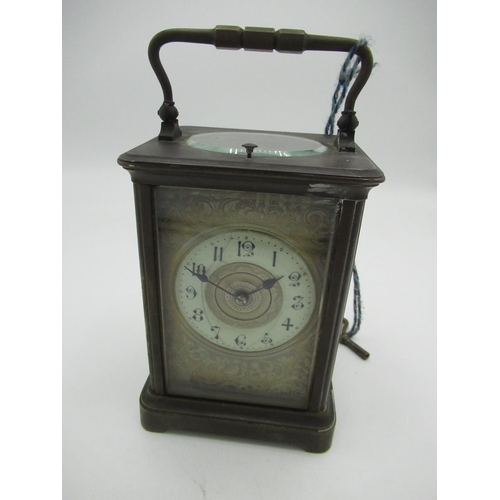 175 - Early 20th C French brass carriage clock, bright cut dial with enameled chapter and bright cut centr... 