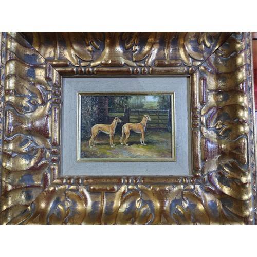 682 - English School (Contemporary):  Study of two hounds before a fence