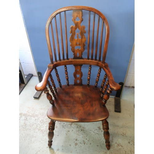701 - C20th high back broad arm Windsor armchair with fir tree splat and shaped seat on ring turned suppor... 