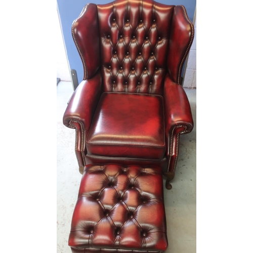 704 - Geo. III style wing back armchair brass nail upholstered in oxblood leather on cabriole legs with lo... 