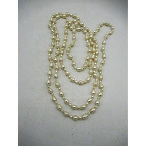 725 - Opera length pearl necklace