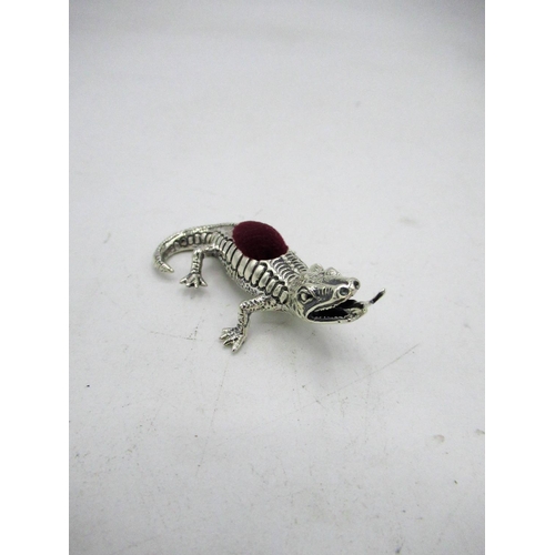 730 - Silver pincushion in the form of a lizard stamped Sterling