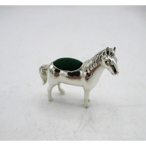 732 - Silver pincushion in the form of a horse stamped Sterling