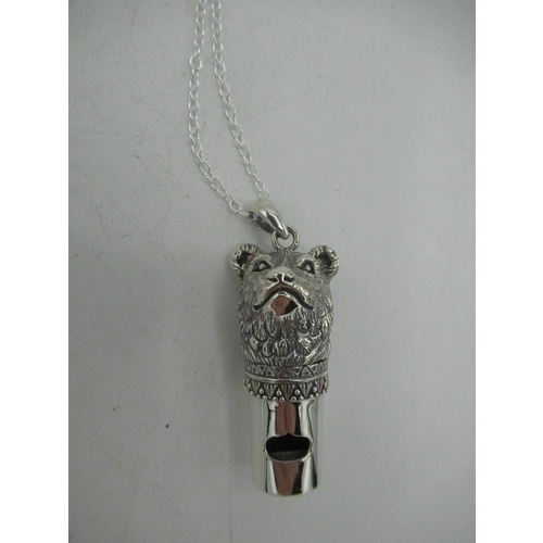 742 - Silver whistle in the form of a bear stamped Sterling on silver chain