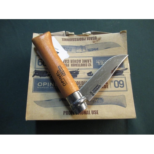 105 - Six boxed as new Opinel no.09 pocket knives