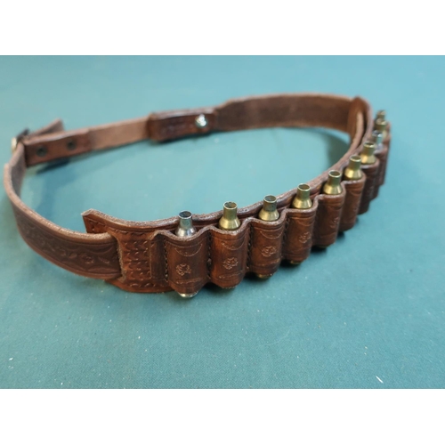 121 - Leather gun strap by Harry Boden with intricate detail and 10 bullet holder for .22 bullets