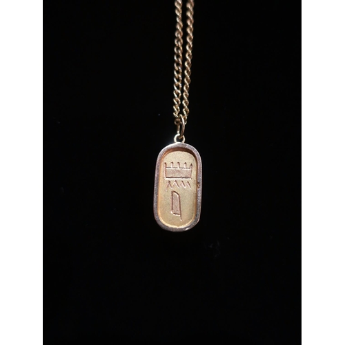 29 - Yellow metal drop pendant with Egyptian Hieroglyphics and yellow metal necklace L56cm with Scarab Be... 