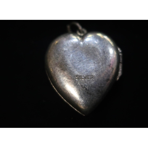 61 - Silver heart shaped locket stamped Silver, Silver hallmarked bottle collar, Silver open bangle with ... 