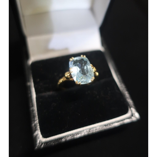 9 - 18ct gold and Aquamarine ring stamped 18ct Size M 1/2 gross 4.3g
