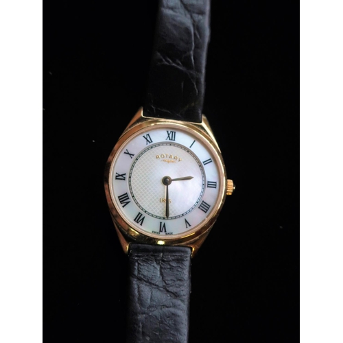 88 - Rotary 1895 Ladies Rotary quartz wrist watch, gold plated case on brown leather strap with gold plat... 