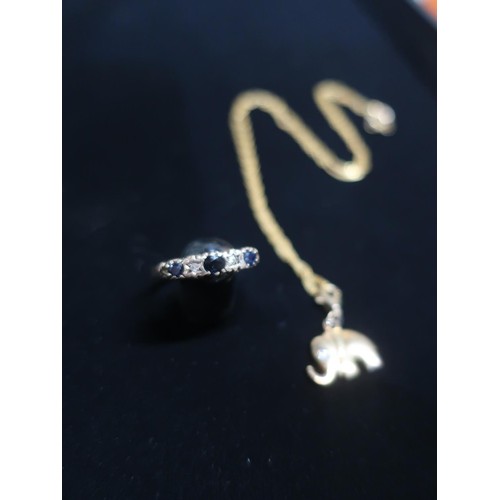 31 - Hallmarked 9ct gold five stone boat head sapphire ring Size U 1/2 gross 2g and a yellow metal chain ... 