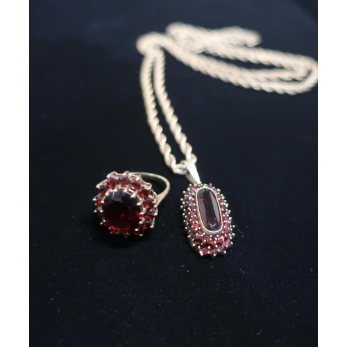 30 - Hallmarked 9ct gold garnet halo ring Size N gross 4.7g and a 9ct gold rope chain necklace with garne... 