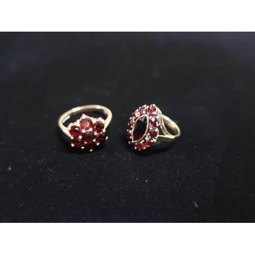 14 - Hallmarked gold and garnet flower design ring Size P (marks unknown and another Garnet marquise desi... 
