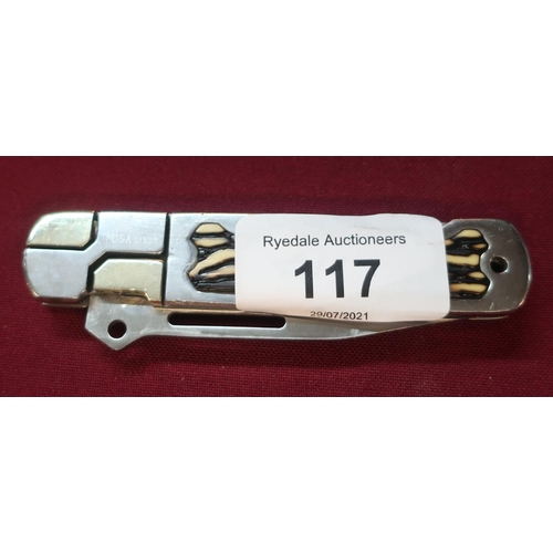 117 - American stainless steel handle and blade pocket knife with ornate design and plastic handle grip