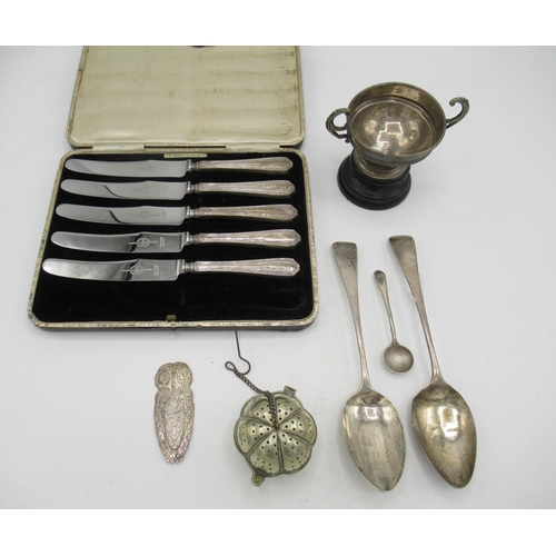 72 - Set of five cased hallmarked silver handled knives, a hallmarked Sterling silver cup awarded to E.I ... 