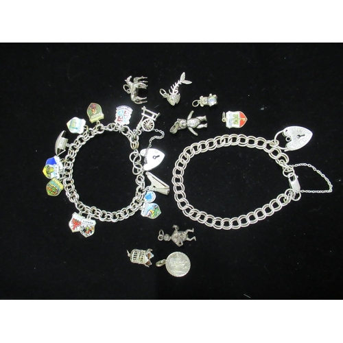48 - Hallmarked Sterling silver double chain charm bracelet with souvenir charms heart padlock and anothe... 
