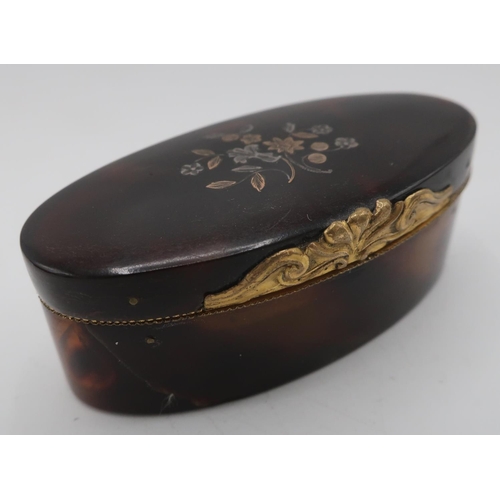 633 - 19th Century gilt metal mounted tortoishell oval patch box, hinged lid inlaid with two colour metal ... 