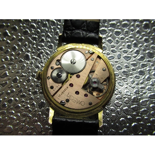 91 - Vintage hand wound fashion watch, gold plated case on black leather strap, 17 jewel movement, case d... 