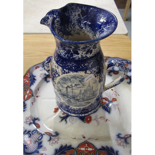 105 - C19th Imari Pattern meat dish with moulded drainer and a C20th Sponge Ware jug decorated with scenes... 