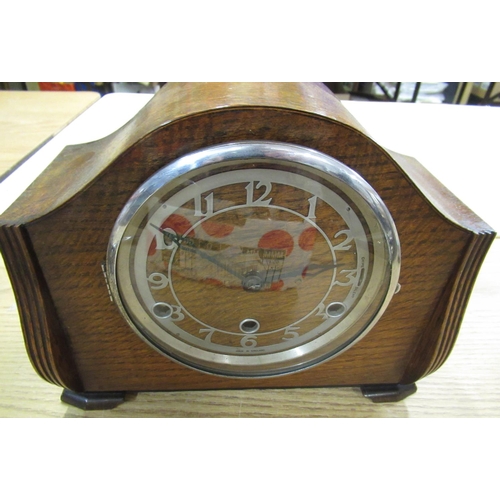 107 - 1930's oak cased mantel clock, silver plated bezel enclosing skeletonised chapter ring, three train ... 