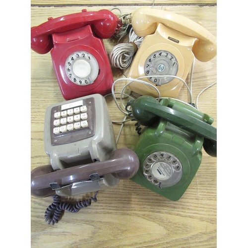 153 - Three 1960s/70s GPO telephones in red, cream and green and a similar wall mounted push button teleph... 