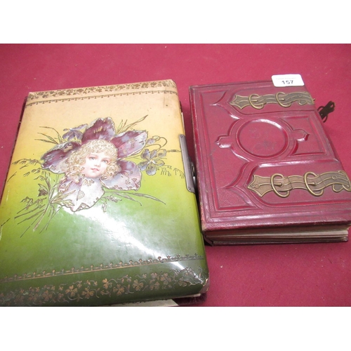 157 - Two Victorian photo albums with a large selection of prints including: J Inskip of the cliff Scarbor... 