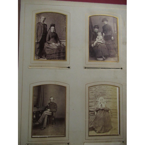 157 - Two Victorian photo albums with a large selection of prints including: J Inskip of the cliff Scarbor... 