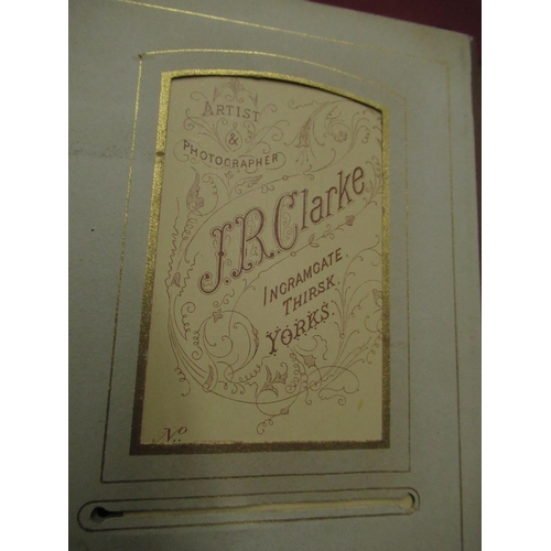 157 - Two Victorian photo albums with a large selection of prints including: J Inskip of the cliff Scarbor... 