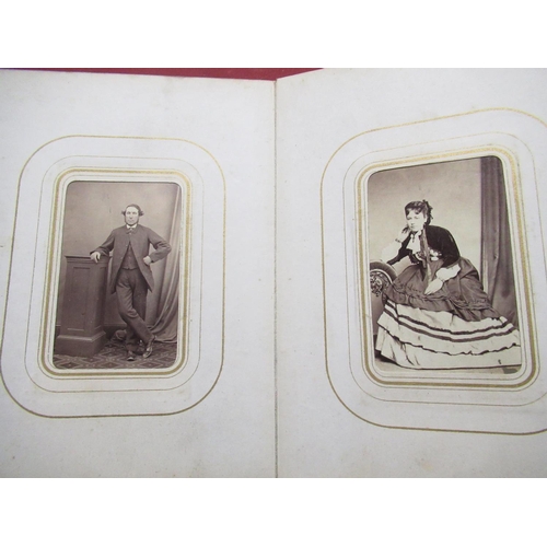 157 - Two Victorian photo albums with a large selection of prints including: J Inskip of the cliff Scarbor... 