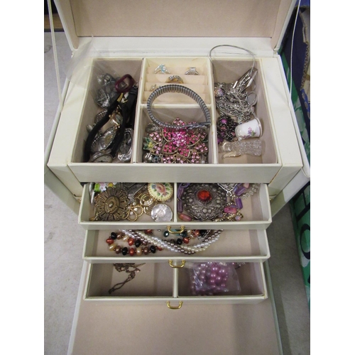 279 - Cream leatherette three drawer jewellery box, containing brooches, necklaces, quartz wristwatches, s... 