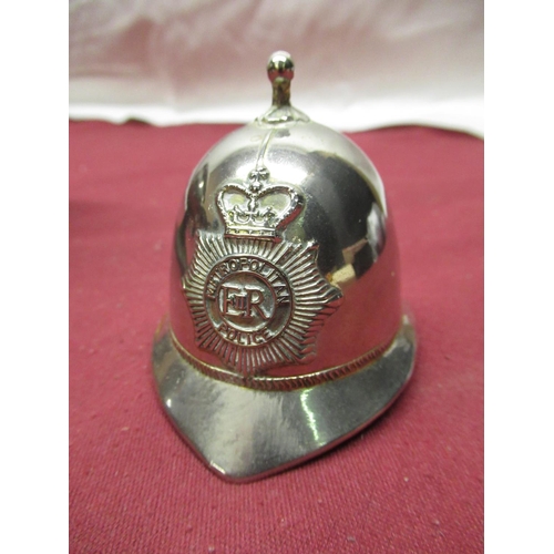 398 - Small selection of sliver plated items including: Police helmet bell, riding boots, pair of salts (1... 