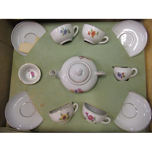 471 - Boxed mid 1960's dolls china tea service, boxed C20th French porcelain headed doll H40cm, and five o... 