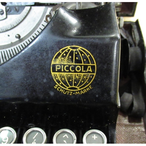 724 - Urania-Piccola vintage typewriter with Querty keyboard in case