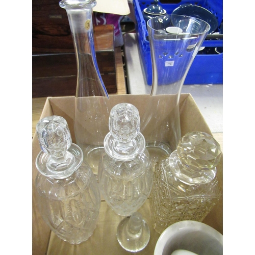 725 - Pair of glass decanters, another square cut decanter, and two wine carafes