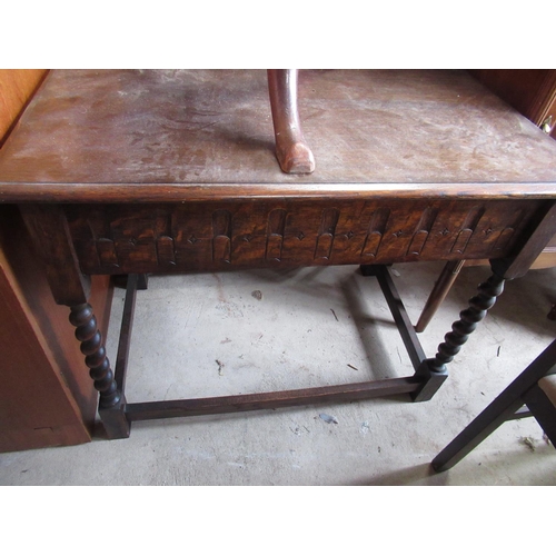 747 - Geo. III style oak rectangular centre table with moulded top and carved frieze on barley twist suppo... 