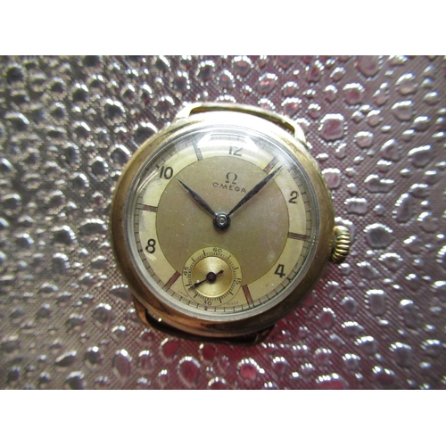 240 - 1930's Omega hand wound wristwatch, rolled gold cushion Dennison Moon case, snap on bezel, hinged ba... 