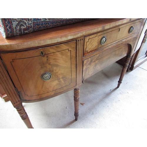 782 - Regency mahogany bow break front sideboard, decorated with ebonised stringing, on ring turned taperi... 