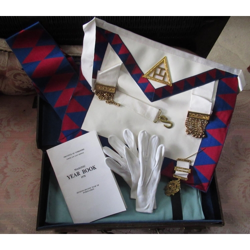 760 - Freemasons leather case containing a craft apron, chapter apron and sash, white gloves, jewel and a ... 