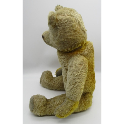 134 - Pre-war American bear, in blonde mohair, with glass eyes, jointed arms and legs and swivel head, rep... 
