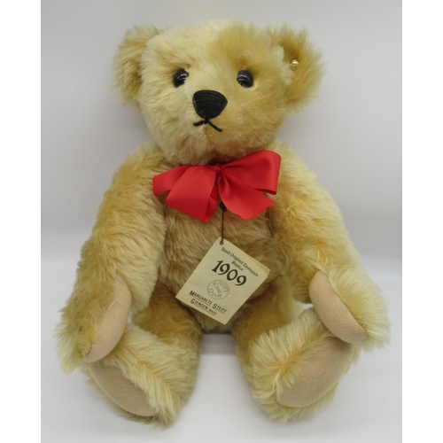 92 - Steiff 1909 Replica Teddy Bear in golden mohair with red ribbon, tag no. 406256, boxed, H40cm